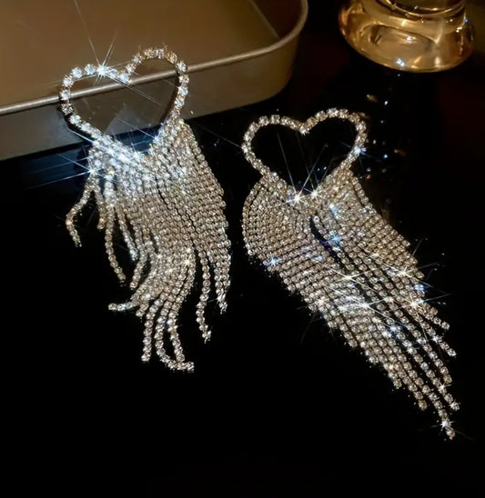 Dazzling, super sparkly, gold, embellished, rhinestone heart shaped earrings. ￼
