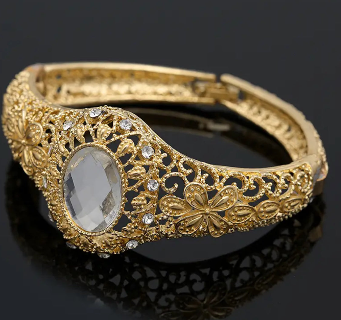 Elegant vintage like five piece gold,rhinestone jewelry set.